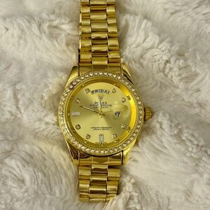 Luxury Gold Timepiece with Crystal Details